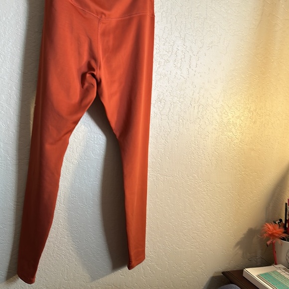 Nike leggings with side logo on the side leg size large NWOT. Burt/brick  color - Picture 5 of 5